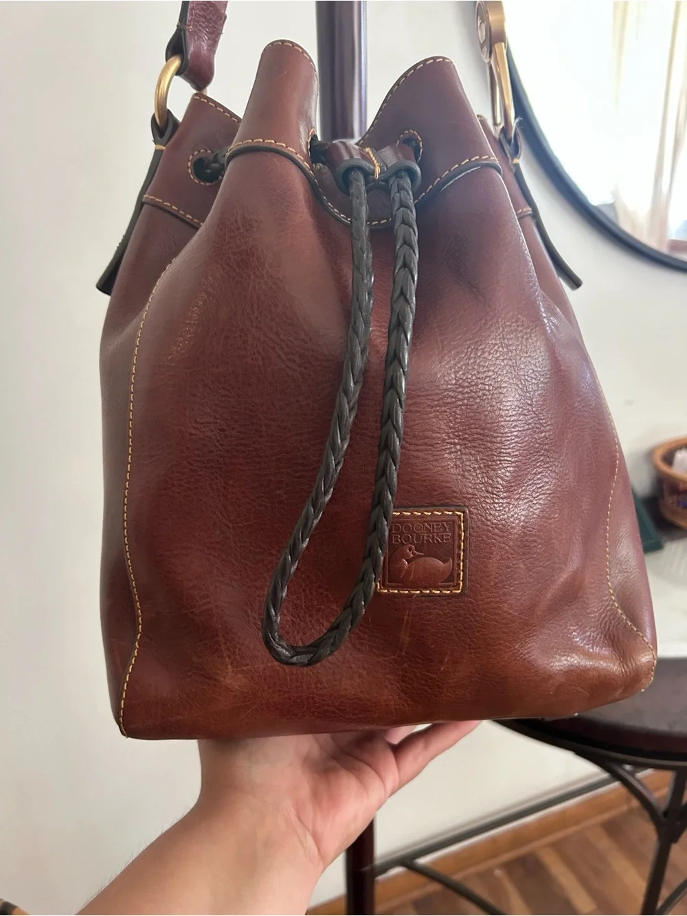 Donney and Brooke Chestnut florentine leather Hattie draw string bucket bag.